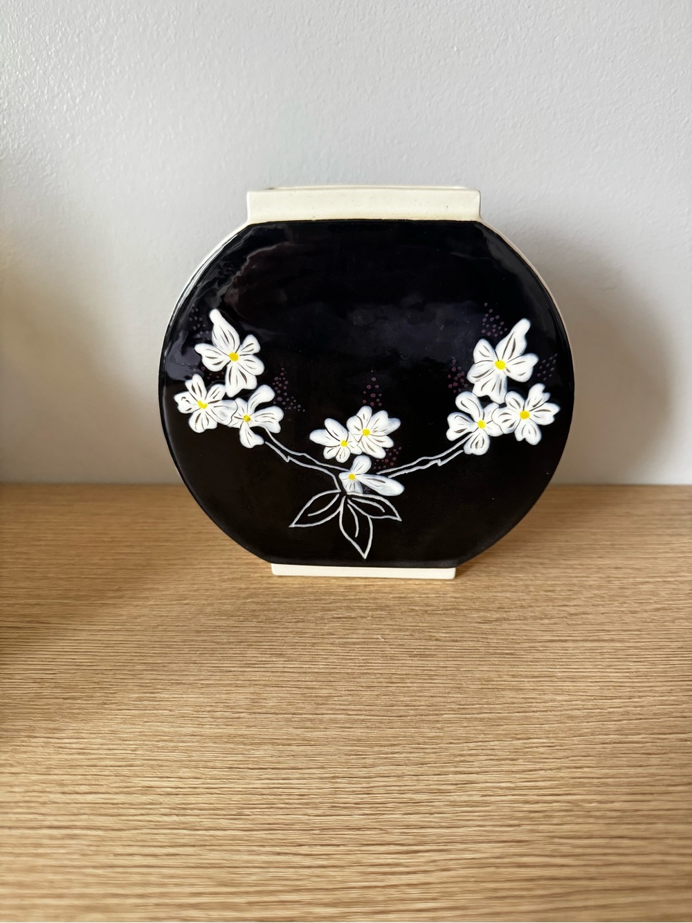 Round Black Ceramic Vase with White Floral Relief